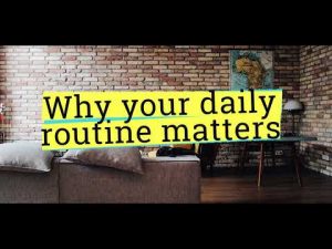 motivational-post-about-why-your-daily-routine-matters-with-brick-wall-backdrop-and-couch-in-living-room